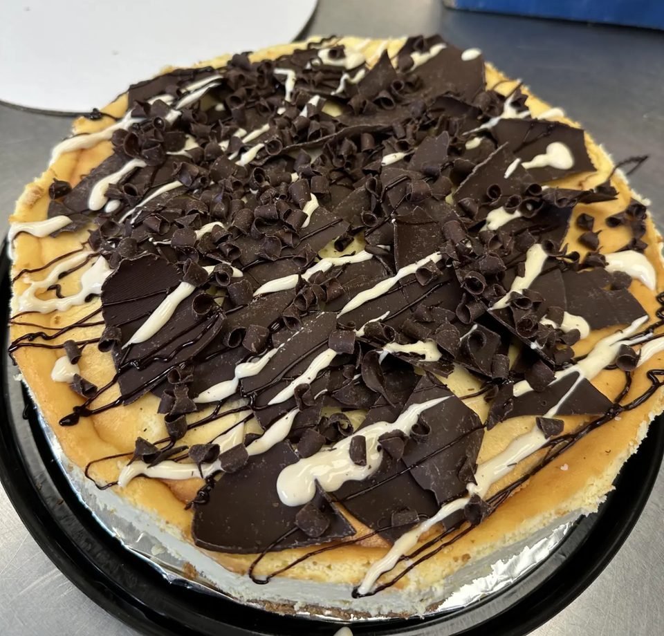 Chocolate-topped cheesecake prepared at Anita’s Pie Shop.
